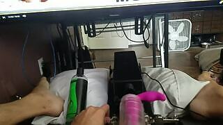 A huge cock milking sex-machine pumps a big cock of a horny teen watching some hardcore porn on the big screen in a homemade POV masturbation.